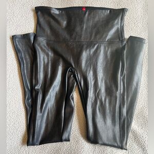 Spanx faux leather black leggings, size L.